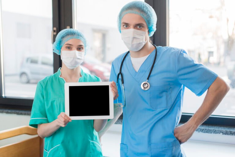 nurses-with-chalkboard-scaled.jpg
